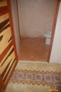 Cementvloer met tegels
