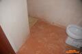 Cementvloer met tegels